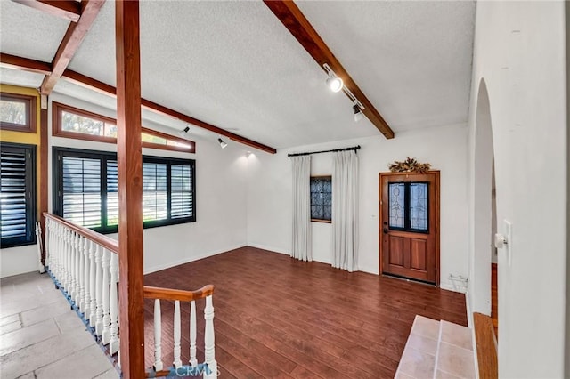 1341 E Harvest Moon St, West Covina, CA 91792 - entryway with a textured ceiling, rail lighting, arched walkways, and wood finished floors