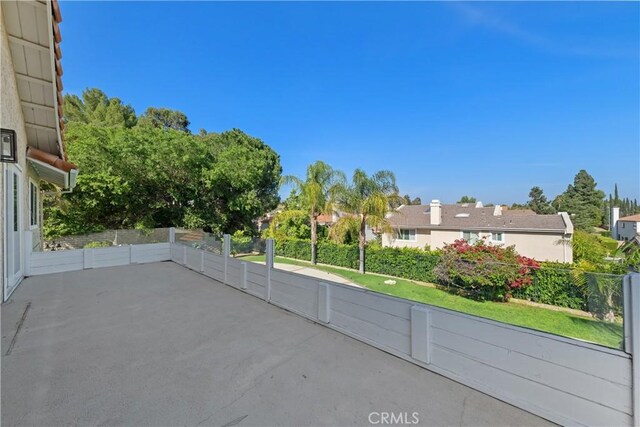 view of patio with fence