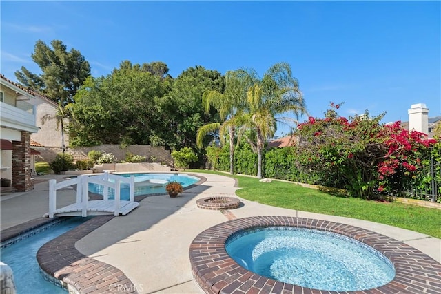 11030 Cozycroft Ave, Chatsworth, CA 91311 - view of swimming pool featuring an in-ground hot tub, a patio area, and a yard