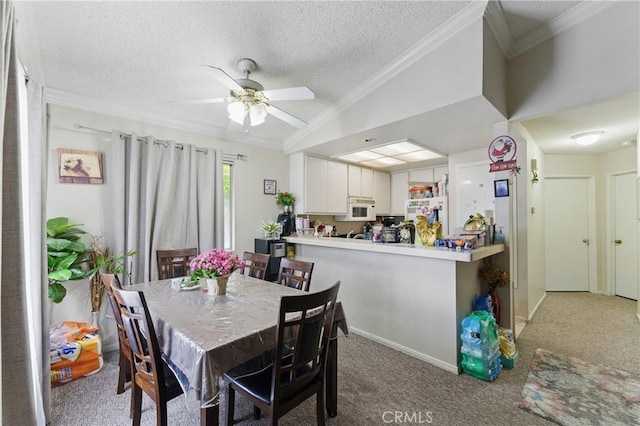 1010 Margarita Dr Unit B201, Corona, CA 92879 - carpeted dining area with crown molding, a ceiling fan, baseboards, a textured ceiling, and lofted ceiling