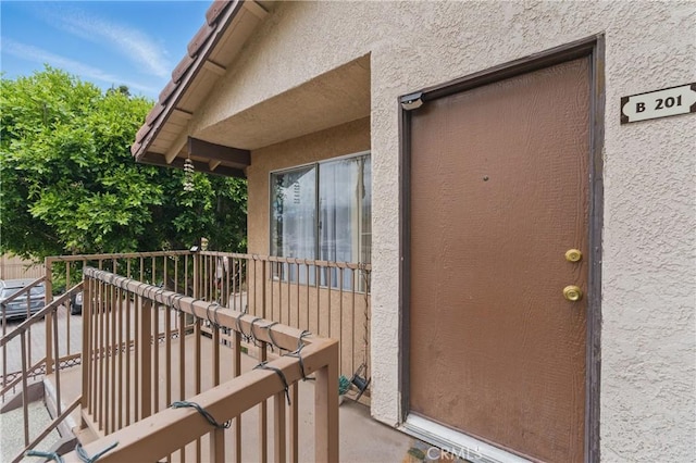 1010 Margarita Dr Unit B201, Corona, CA 92879 - property entrance featuring stucco siding