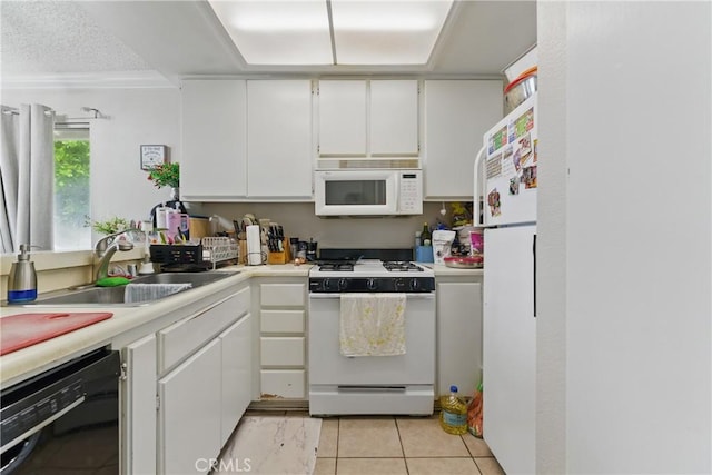 1010 Margarita Dr Unit B201, Corona, CA 92879 - kitchen with white cabinetry, white appliances, light countertops, and a sink