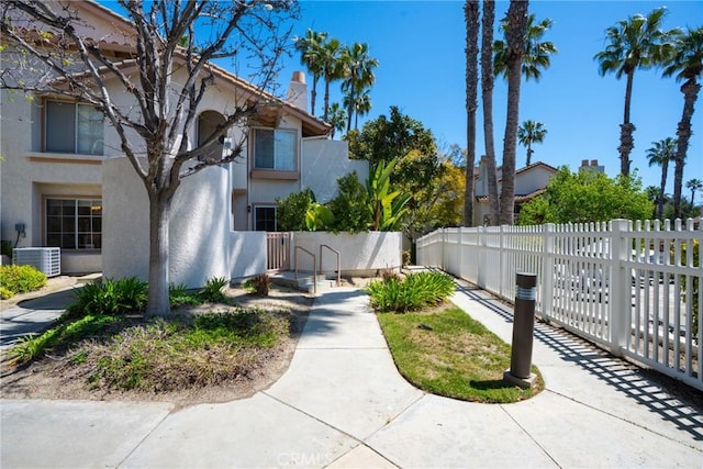 surrounding community featuring fence