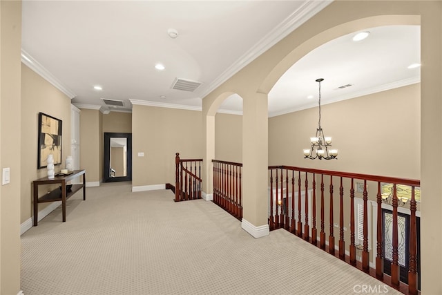 15841 Aurora Crest Dr, Whittier, CA 90605 - hall featuring an upstairs landing, recessed lighting, light colored carpet, arched walkways, and crown molding