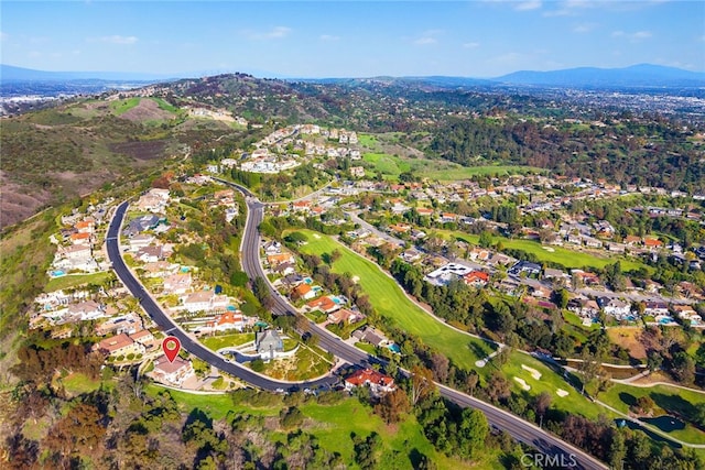 15841 Aurora Crest Dr, Whittier, CA 90605 - aerial view of property and surrounding area with a mountain backdrop, nearby suburban area, and a golf club