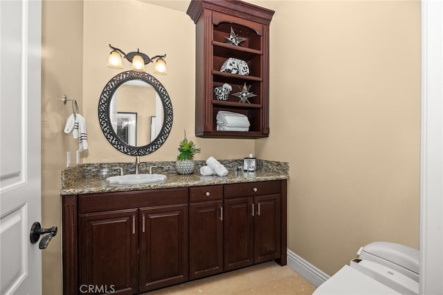15841 Aurora Crest Dr, Whittier, CA 90605 - bathroom featuring toilet, vanity, and baseboards