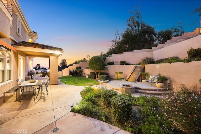 15841 Aurora Crest Dr, Whittier, CA 90605 - view of patio featuring a fire pit, stairs, and outdoor dining area