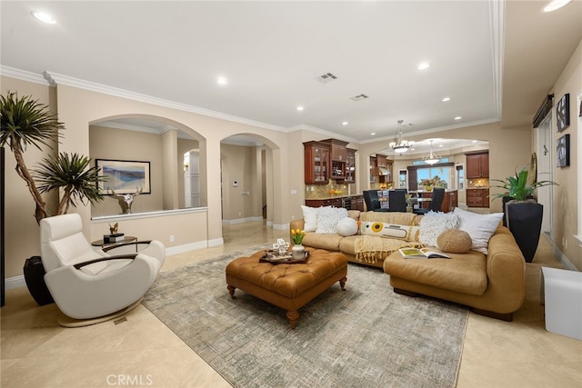 15841 Aurora Crest Dr, Whittier, CA 90605 - living room with arched walkways, recessed lighting, light tile patterned floors, ornamental molding, and baseboards