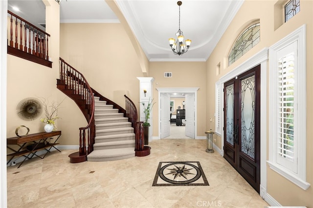 15841 Aurora Crest Dr, Whittier, CA 90605 - foyer with stairway, a high ceiling, crown molding, a chandelier, and baseboards
