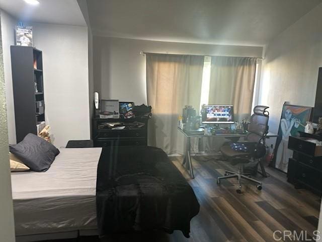475 N Midway Unit 173, Escondido, CA 92027 - bedroom featuring wood finished floors and arched walkways