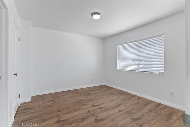 247 W 223rd St Unit D, Carson, CA 90745 - empty room featuring wood finished floors and baseboards