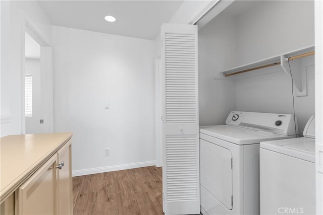 247 W 223rd St Unit D, Carson, CA 90745 - clothes washing area with independent washer and dryer, baseboards, light wood-style flooring, and recessed lighting