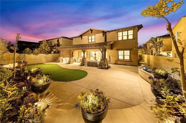 123 Calderon, Irvine, CA 92618 - rear view of house with a patio area, a fenced backyard, a pergola, and stucco siding