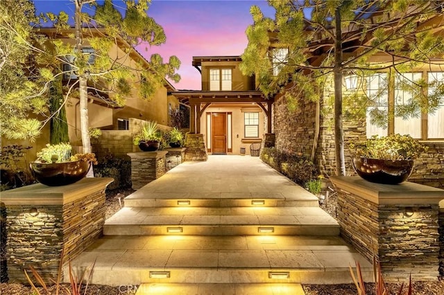 123 Calderon, Irvine, CA 92618 - property entrance featuring stucco siding