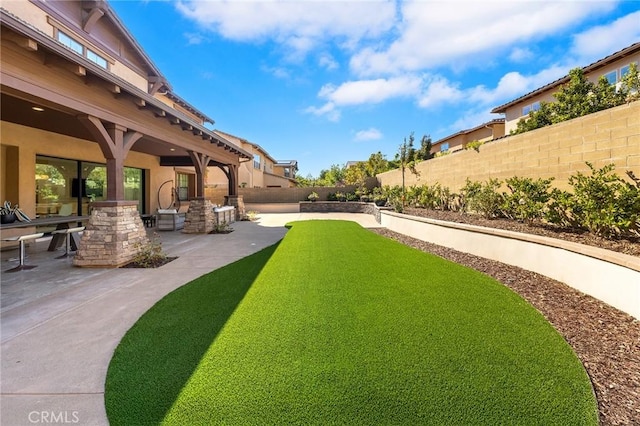 123 Calderon, Irvine, CA 92618 - view of yard with a fenced backyard and a patio area
