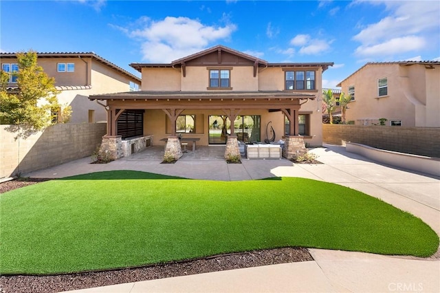123 Calderon, Irvine, CA 92618 - rear view of property with a lawn, a patio, a fenced backyard, and stucco siding
