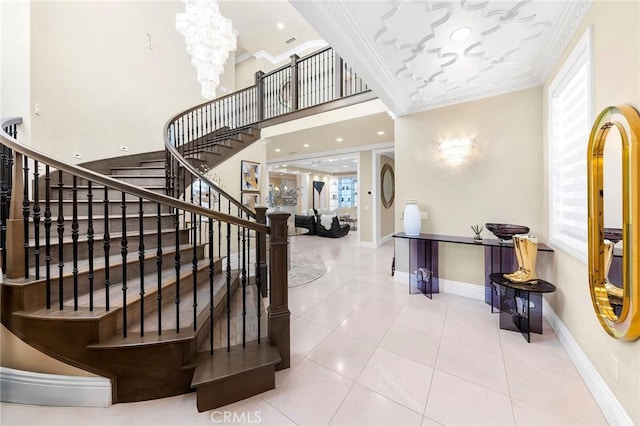 123 Calderon, Irvine, CA 92618 - staircase featuring baseboards, an inviting chandelier, ornamental molding, and a wealth of natural light