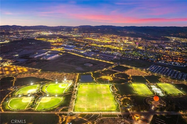 123 Calderon, Irvine, CA 92618 - aerial view at dusk featuring a mountain view