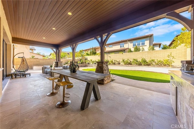 123 Calderon, Irvine, CA 92618 - view of patio with a fenced backyard and outdoor dining space