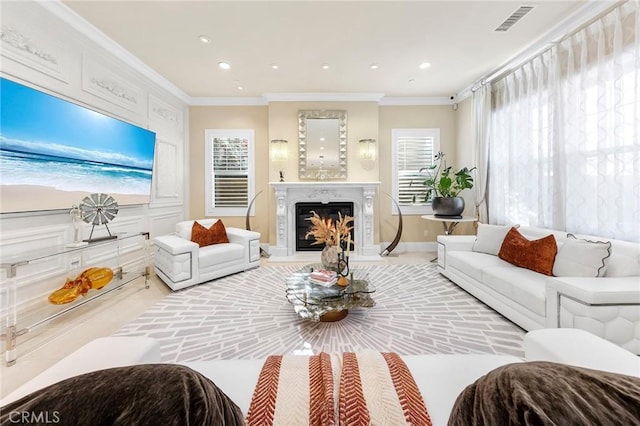 123 Calderon, Irvine, CA 92618 - living room featuring a premium fireplace, crown molding, visible vents, and recessed lighting