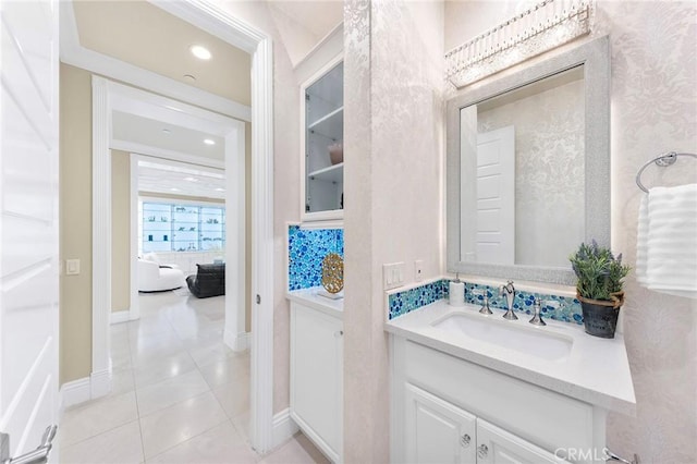 123 Calderon, Irvine, CA 92618 - bathroom featuring tile patterned floors, baseboards, and vanity