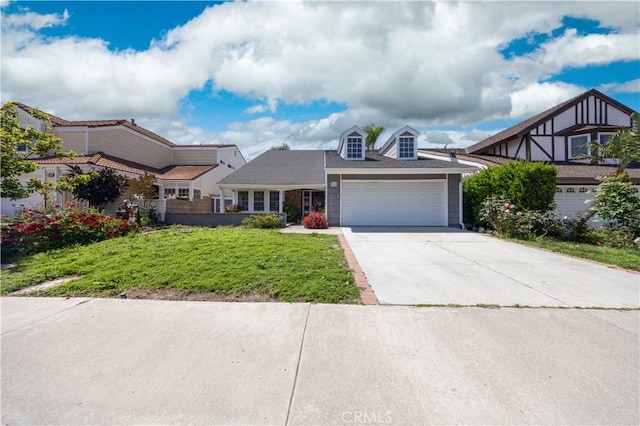 view of front facade with an attached garage, driveway, and a front lawn