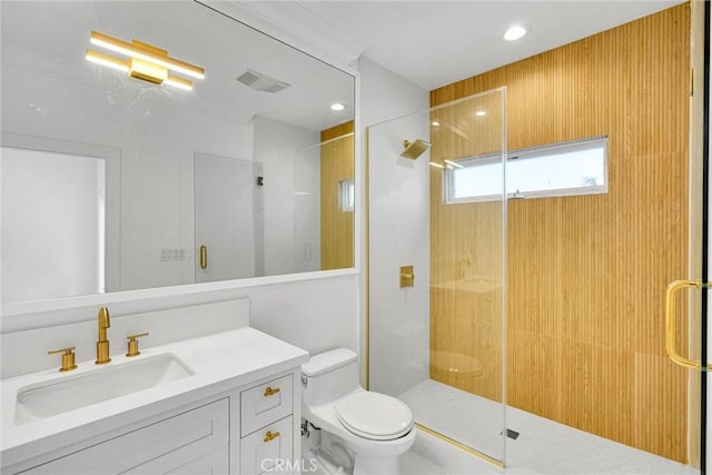10050 Olivia Ter, Sun Valley, CA 91352 - bathroom featuring toilet, vanity, visible vents, and a stall shower