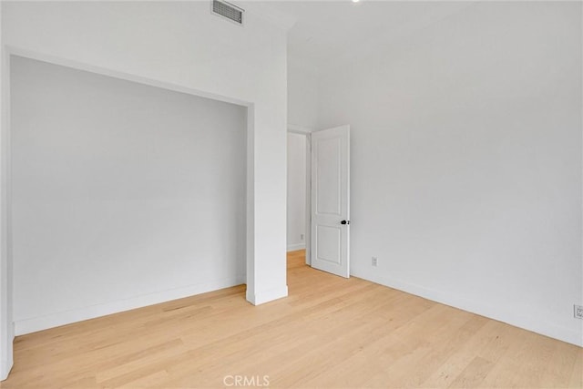 10050 Olivia Ter, Sun Valley, CA 91352 - empty room with baseboards, wood finished floors, and visible vents