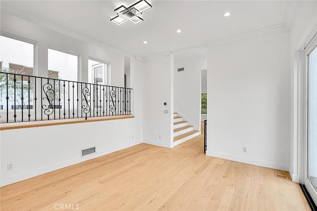 10050 Olivia Ter, Sun Valley, CA 91352 - spare room featuring wood finished floors, visible vents, recessed lighting, and crown molding