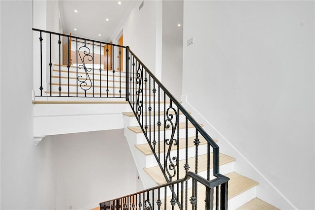10050 Olivia Ter, Sun Valley, CA 91352 - stairs with recessed lighting and baseboards