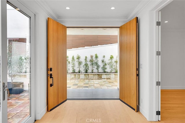 10050 Olivia Ter, Sun Valley, CA 91352 - doorway featuring light wood-style floors, baseboards, and ornamental molding
