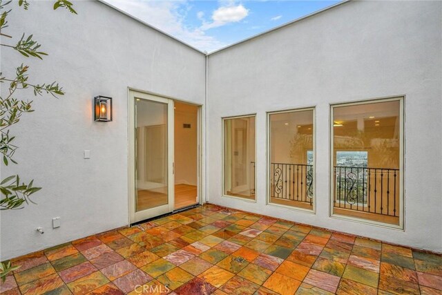 10050 Olivia Ter, Sun Valley, CA 91352 - back of house featuring stucco siding and a patio