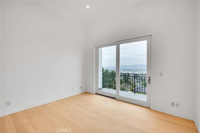 10050 Olivia Ter, Sun Valley, CA 91352 - empty room with baseboards, wood finished floors, and ornamental molding