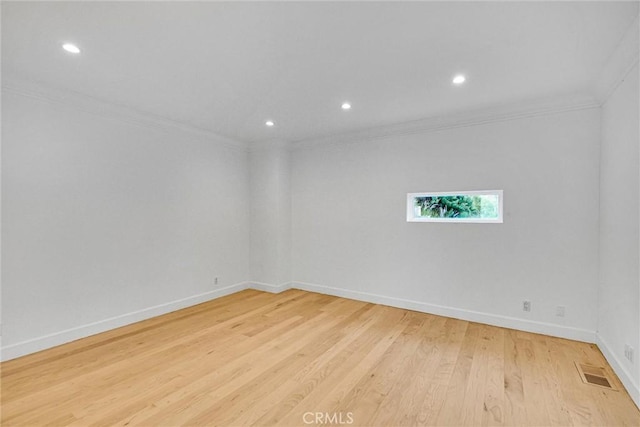 10050 Olivia Ter, Sun Valley, CA 91352 - unfurnished room with light wood-type flooring, baseboards, ornamental molding, visible vents, and recessed lighting