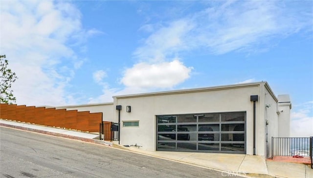 10050 Olivia Ter, Sun Valley, CA 91352 - view of side of property featuring stucco siding and fence