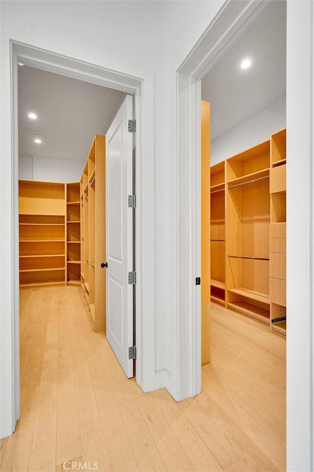 10050 Olivia Ter, Sun Valley, CA 91352 - hallway with wood finished floors and recessed lighting