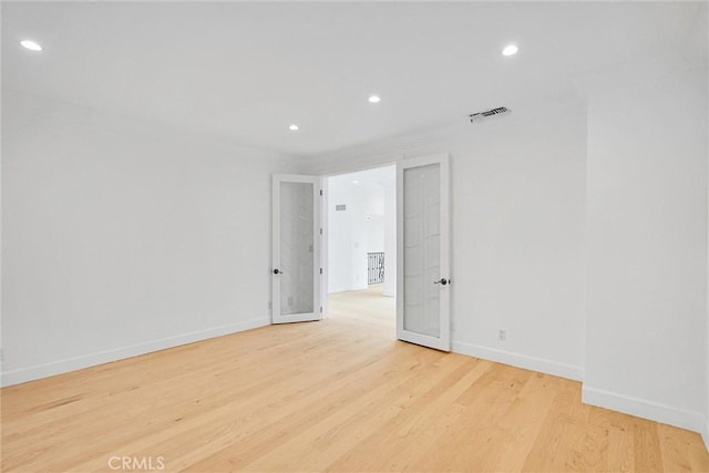 10050 Olivia Ter, Sun Valley, CA 91352 - unfurnished room with baseboards, wood finished floors, visible vents, and recessed lighting