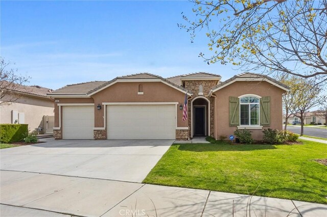 6207 Shelburne Dr, Bakersfield, CA 93306 - view of front of property with stone siding, an attached garage, stucco siding, a front yard, and concrete driveway