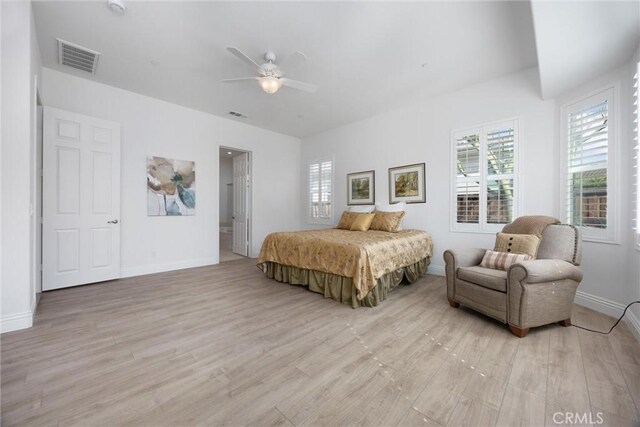 6207 Shelburne Dr, Bakersfield, CA 93306 - bedroom with light wood-style flooring, baseboards, and a ceiling fan