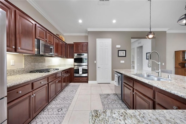 6207 Shelburne Dr, Bakersfield, CA 93306 - kitchen featuring stainless steel appliances, a sink, crown molding, decorative light fixtures, and light stone counters