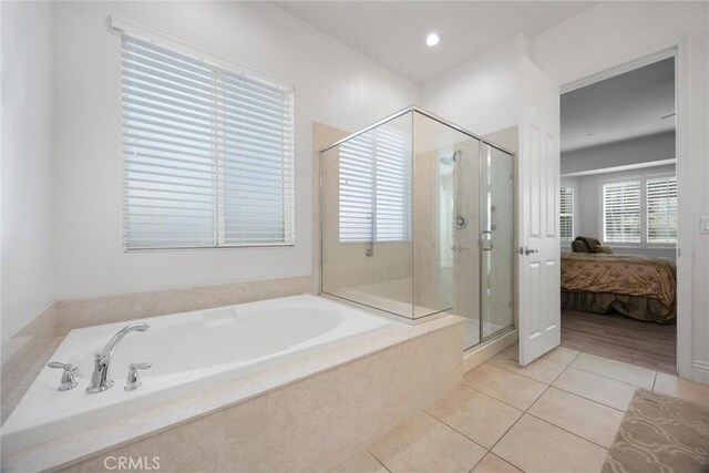 6207 Shelburne Dr, Bakersfield, CA 93306 - full bath featuring a bath, a stall shower, tile patterned floors, and ensuite bathroom