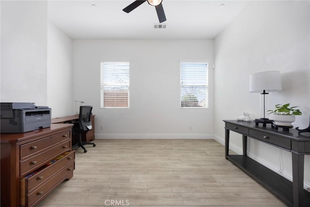 6207 Shelburne Dr, Bakersfield, CA 93306 - office space with healthy amount of natural light, ceiling fan, light wood-style floors, and baseboards