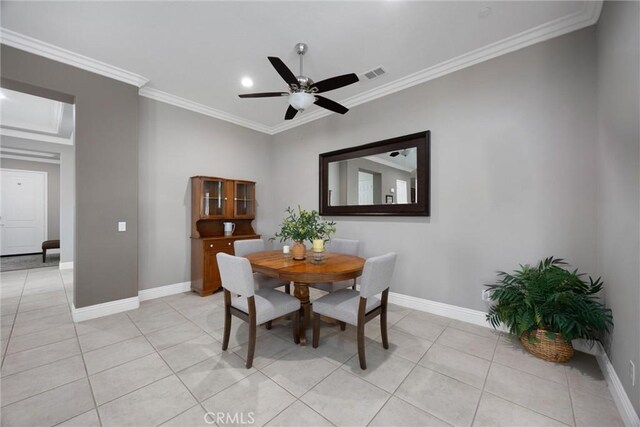 6207 Shelburne Dr, Bakersfield, CA 93306 - dining room featuring light tile patterned floors, a ceiling fan, ornamental molding, and baseboards