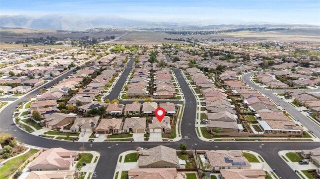6207 Shelburne Dr, Bakersfield, CA 93306 - aerial overview of property's location featuring a mountain backdrop and nearby suburban area