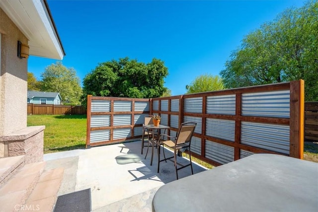 view of patio / terrace with a fenced backyard
