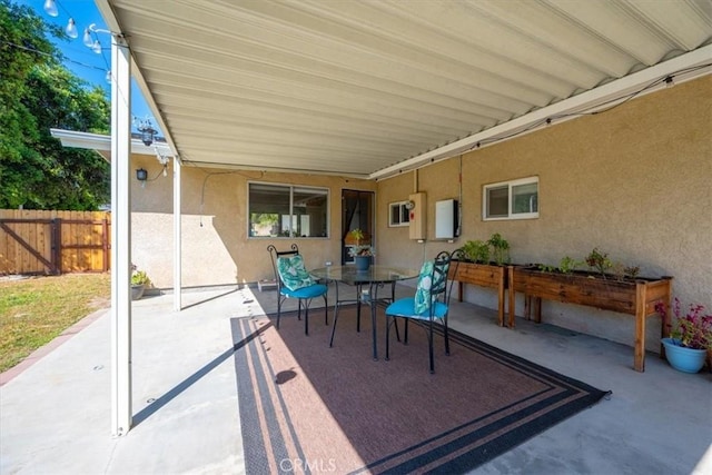 view of patio / terrace with fence and outdoor dining space