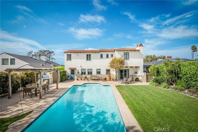 624 Calle Miramar, Redondo Beach, CA 90277 - rear view of property with a pergola, stucco siding, an outdoor pool, a patio, and a tiled roof