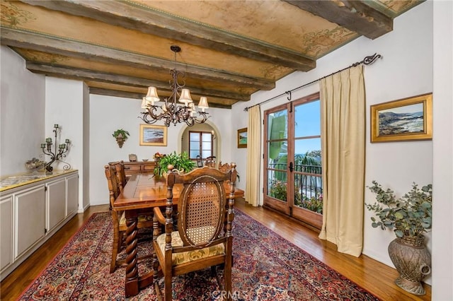 624 Calle Miramar, Redondo Beach, CA 90277 - dining area featuring dark wood-style floors, beamed ceiling, and a chandelier