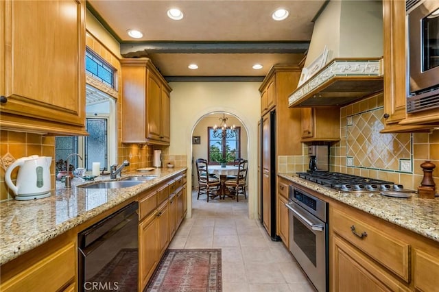 624 Calle Miramar, Redondo Beach, CA 90277 - kitchen featuring appliances with stainless steel finishes, custom range hood, a sink, tasteful backsplash, and recessed lighting
