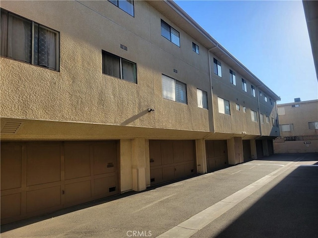18405C Collins St Unit C, Tarzana, CA 91356 - view of property featuring an attached garage